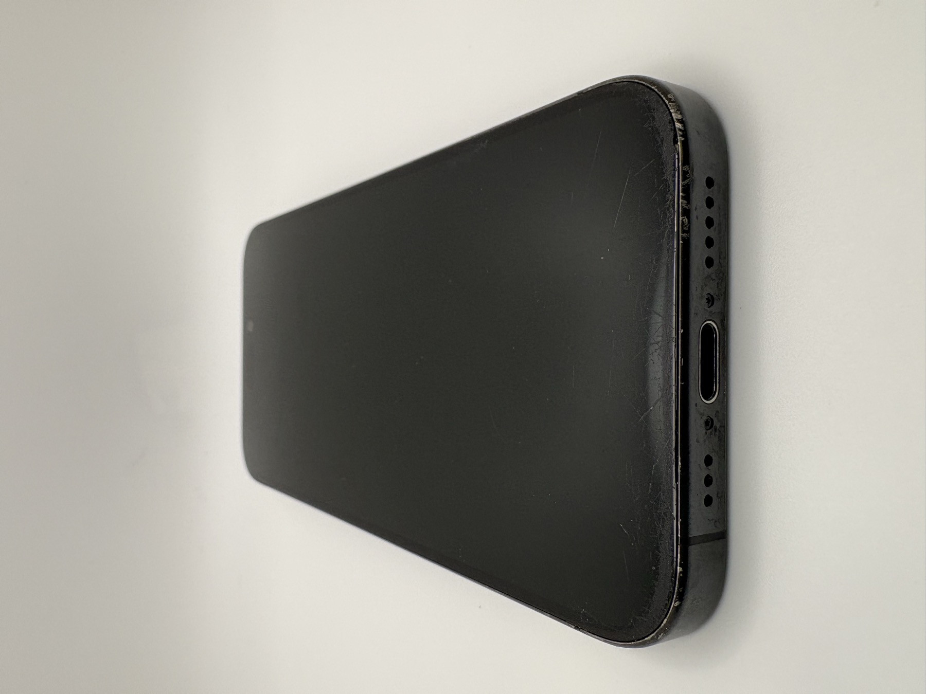 Acceptable device — front view showing heavy wear